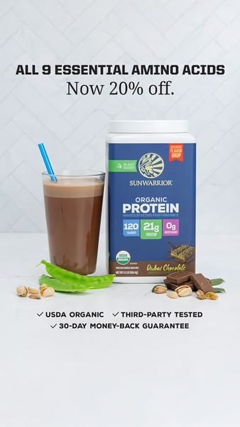 A vertical ad creative featuring a protein shake, product tub, and key nutritional callouts presented against a clean white tile background.